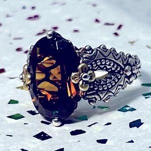 Sterling Silver Floral Filigree Ring with Brown Oval Gem